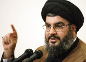 Hezbollah chief Sheikh Hassan Nasrallah is seen during his speech at the fourth Arab conference to support the Lebanese and Palestinian resistance, 30 March 2006 in Beirut. Nine Lebanese and Palestinian nationals were arrested for plotting to kill Sheikh Hassan Nasrallah, the daily As-Safir reported today. The assassination of the head of armed Shiite fundamentalist party was planned for April 28 when Nasrallah was due to attend the next session of Lebanon's ongoing national dialogue, the paper said, citing security sources. AFP PHOTO/RAMZI HAYDAR